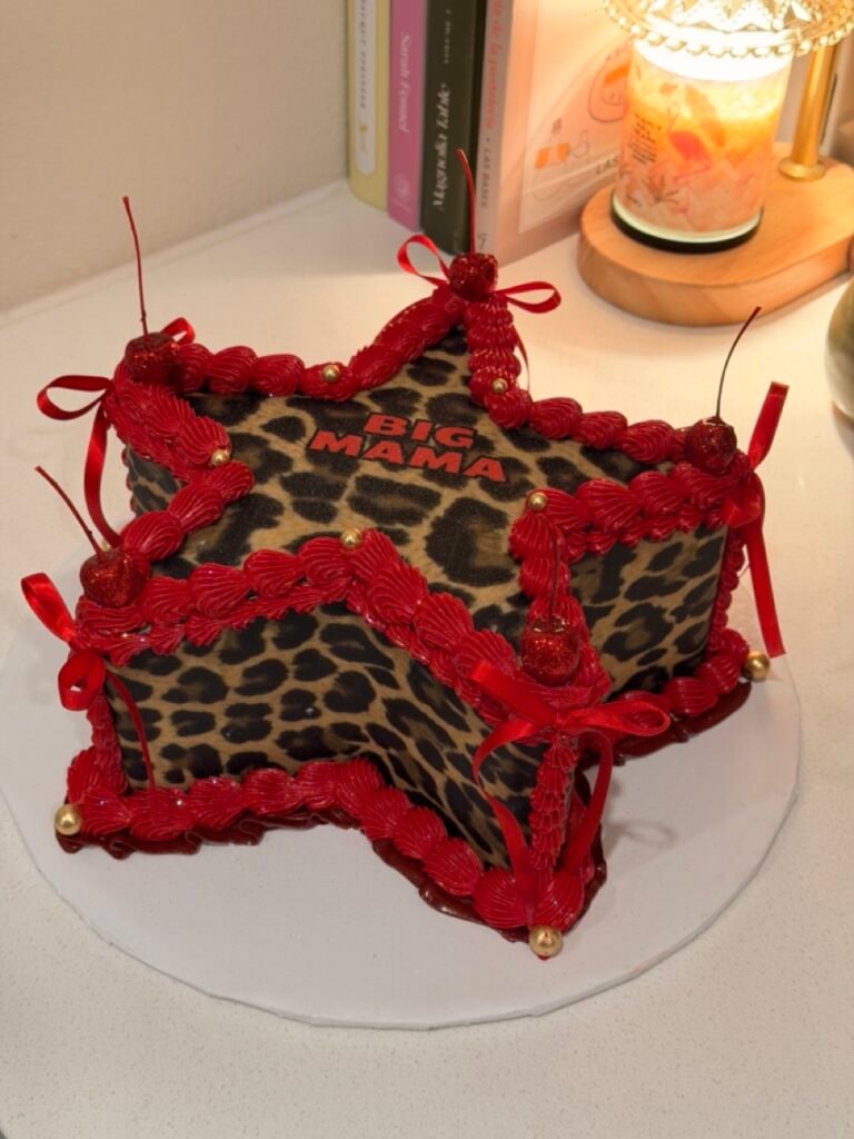 star animal print cake from valenbakes with red borders for birthday