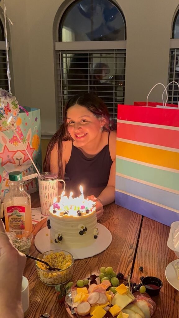 happy client valenbakes person with their custom cake